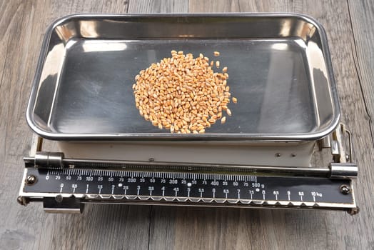 Old kitchen scales on wood