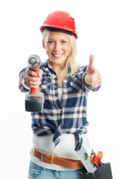 Female craftsman with cordless screwdriver and drill