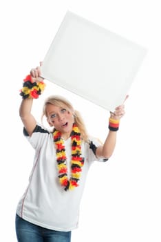 Blonde football fan holds a poster