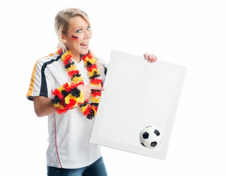Blonde football fan holds a poster