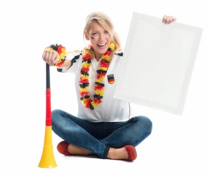 Blonde football fan with Vuvuzela holds a poster