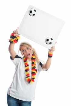 Blonde football fan holds a poster