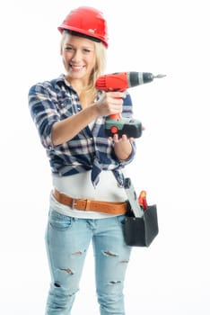 Female craftsman with cordless screwdriver and drill