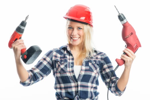 Female craftsman with cordless screwdriver and drill
