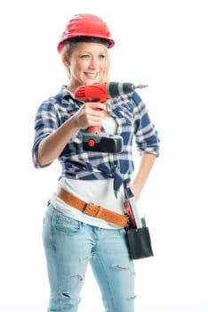 Female craftsman with cordless screwdriver and drill