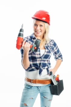 Female craftsman with cordless screwdriver and drill