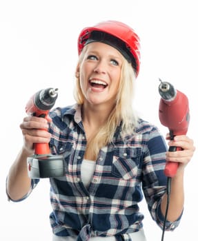 Female craftsman with cordless screwdriver and drill