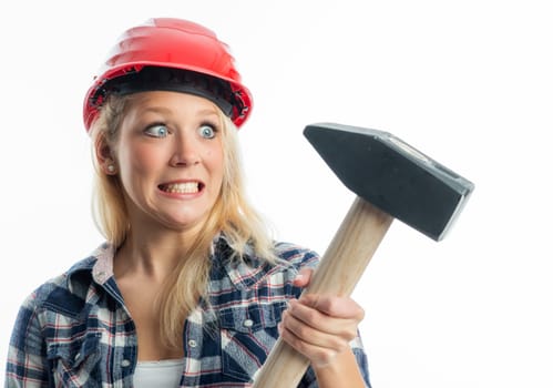 Female craftsman with sledgehammer