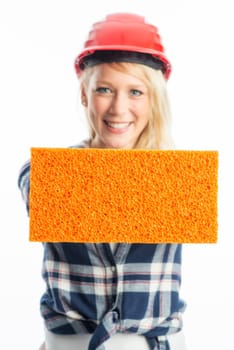 Female craftsman with sponge as advertising space
