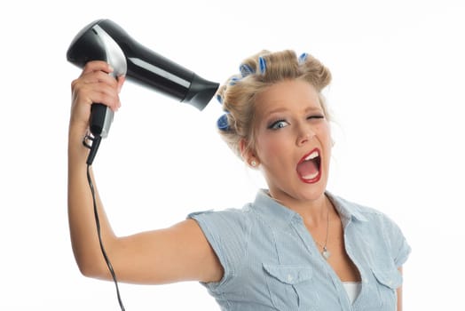 Woman blow-drys hair