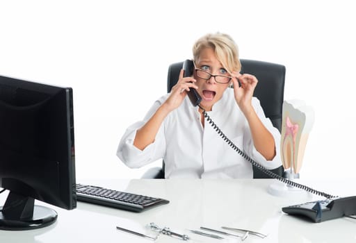 Angry dentist on the phone