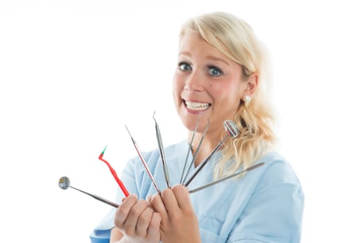 Dentist with dental cutlery