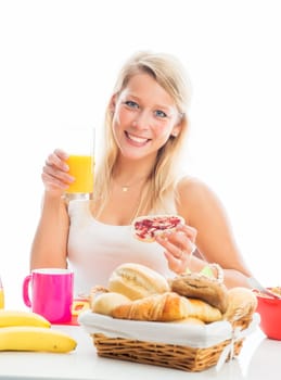 Blonde woman at the breakfast table