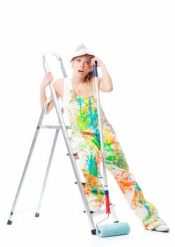 Tired painter on step ladder