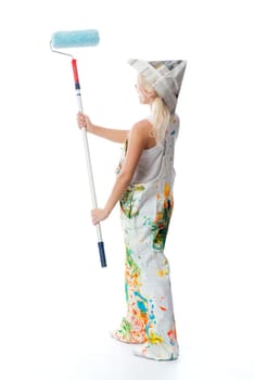 Female painter with colour roll