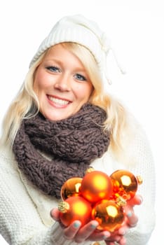 Blonde woman with Christmas baubles