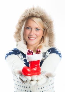 Woman holds Santa Claus boots