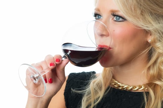 Blonde woman with glass of red wine