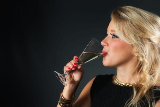 Elegant woman with sparkling wine