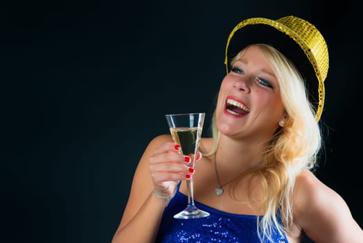 Blonde woman celebrates New Year's Eve