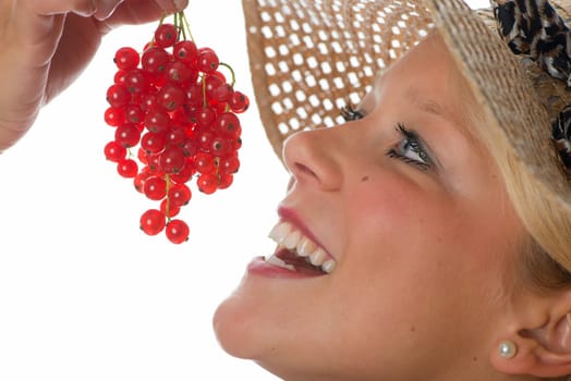 Blonde woman with currants