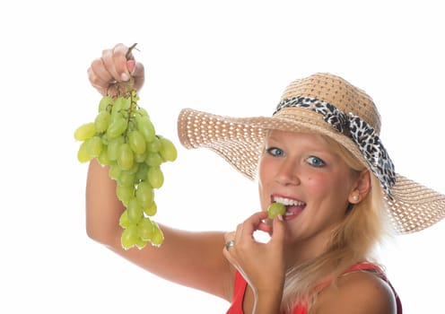Blonde woman with grapes