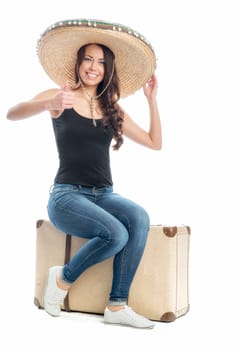 Woman with suitcase and sombrero