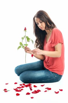 Woman makes love test on flower
