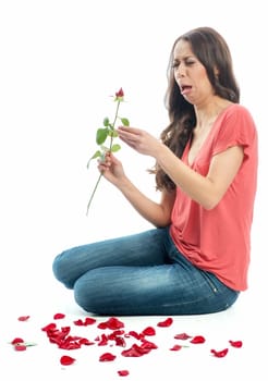 Woman makes love test on flower