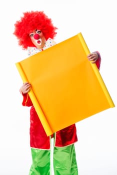 Clown holds advertising sign