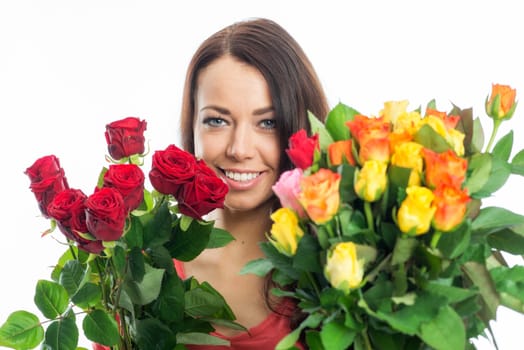 Young woman with bouquets of roses