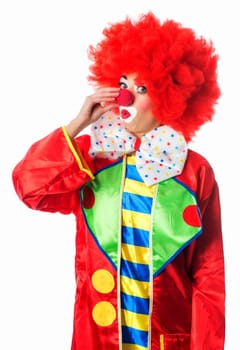 Clown grabs his nose