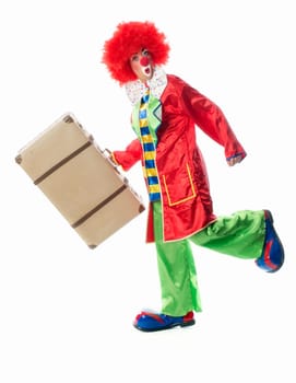 Clown with suitcase