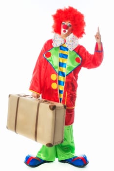 Clown with suitcase