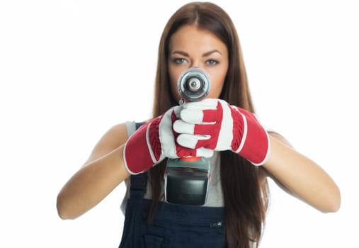 Female craftsman with cordless screwdriver