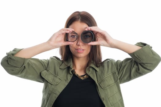 Young woman holds camera filter