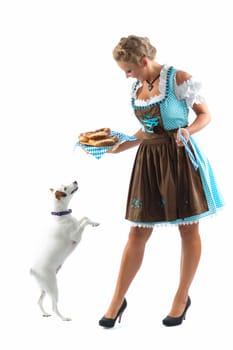 Bavarian woman with pretzels and dog