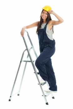 Female craftsman on step ladder
