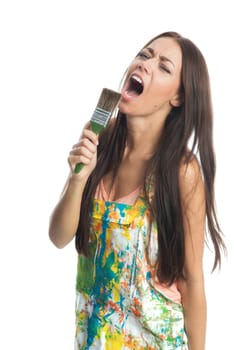 Woman with painter's brush sings