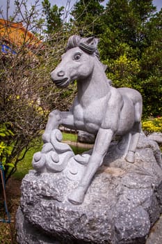 Asian temple with zodiac signs and religious symbols in Malaysia