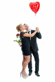 In love couple with heart balloon