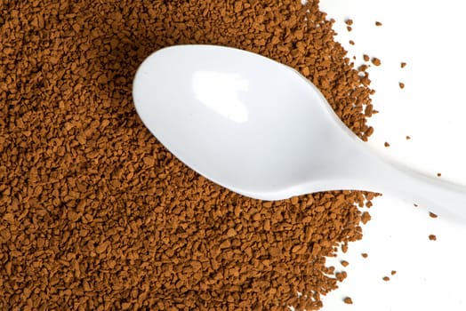 Instant coffee with plastic spoon