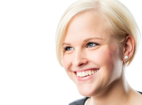 Blonde young girl smiles