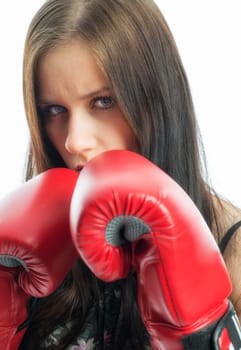 Young girl with boxing gloves