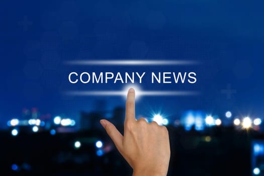 hand clicking company news button on a touch screen interface
