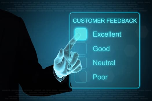 business hand pushing customer feedback on a touch screen interface