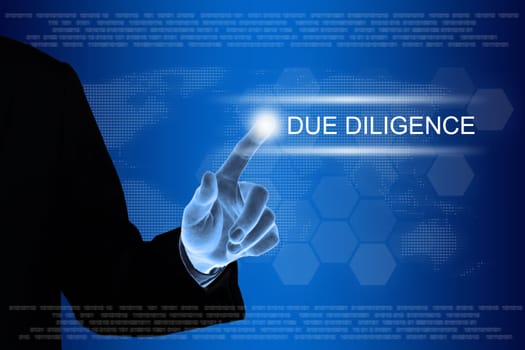 business hand pushing due diligence button on a touch screen interface
