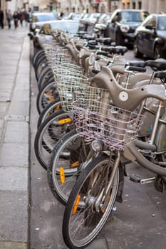 Bicycles for rent at a station in a big city