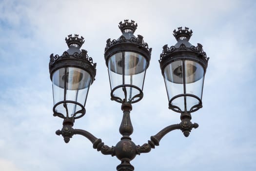Old iron lantern electric outdoor close-up