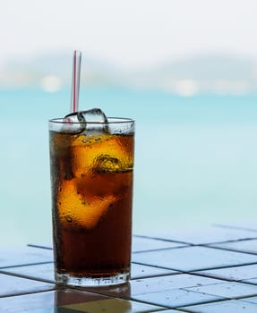 Glass of cola with ice